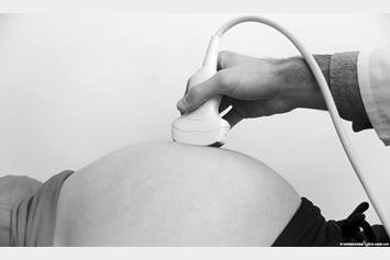 Pregnant women getting a fetal electrocardiogram.