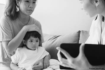 family talking to doctor