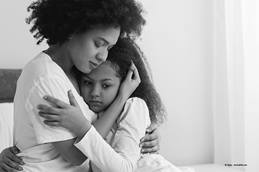 mother and daughter hugging