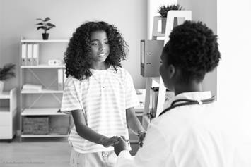 tween child talking to a doctor