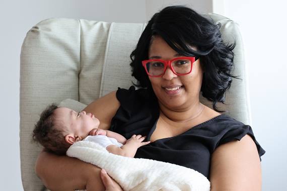 Finley's mom holding her