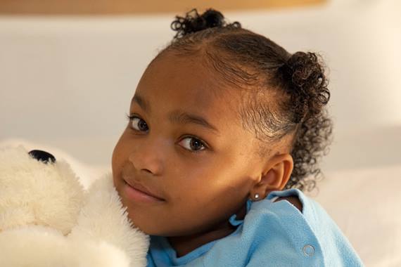 La'Miya with a teddy bear