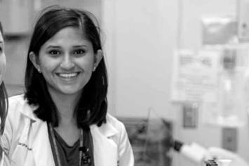 Two female residents in a research lab