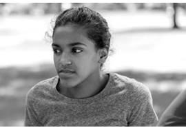 Tween Girl Reflecting While Standing Outside